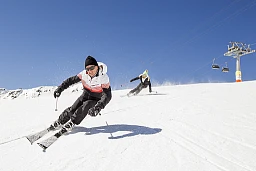 This Jenny und seine Partnerin Ursula Abgottspon beim Skifahren This Jenny und seine Partnerin Ursula Abgottspon beim Skifahren