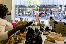 Katharina Vogel in front of a shoe store in Biel during the Body and Freedom nude festival