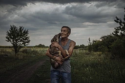 Valerii brought as much as he could from his home when the battlefront reached his hometown of Dokuchaevsk including his pet dogs. “Sometimes we would go hungry just so that we can feed them,” says Valerii. Two of his dogs, Lyalya and Dusya follow him around the yard, apparently listening to his every word. “They feel my emotions. When I leave, they wait for me at the gates. They are my real friends. They are part of my family.” The canine family continues to grow. Lyalya’s son, Khitri was born in Novyi Donbas. A fourth dog, Richard, was dumped anonymously one at their home one day. “He was homeless, like we were once. So how could we leave him alone?” Valerii brought as much as he could from his home when the battlefront reached his hometown of Dokuchaevsk including his pet dogs. “Sometimes we would go hungry just so that we can feed them,” says Valerii. Two of his dogs, Lyalya and Dusya follow him around the yard, apparently listening to his every word. “They feel my emotions. When I leave, they wait for me at the gates. They are my real friends. They are part of my family.” The canine family continues to grow. Lyalya’s son, Khitri was born in Novyi Donbas. A fourth dog, Richard, was dumped anonymously one at their home one day. “He was homeless, like we were once. So how could we leave him alone?”