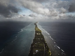 Waves crash along the narrow shores of Majuro, the Marshall Islands. For many living in Majuro, finding ways to prevent or minimize the effects of costal erosion is a major consideration for long term life plans. Waves crash along the narrow shores of Majuro, the Marshall Islands. For many living in Majuro, finding ways to prevent or minimize the effects of costal erosion is a major consideration for long term life plans.