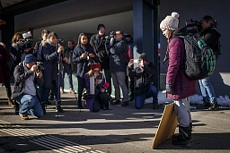 16 year-old Swedish climate activist Greta Thunberg (right) arrives to attend the 49th Annual Meeting of the World Economic Forum, WEF, in Davos, Switzerland, Wednesday, January 23, 2019. Starting the first school strike for climate outside the Swedish parliament building aiming to raise awareness of global warming Greta Thunberg has inspired tens of thousands of student over the globe to organize their own strikes to further raise government awareness on climate change. (KEYSTONE/Valentin Flauraud)