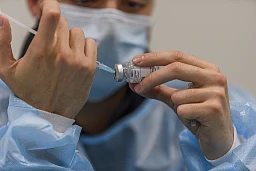 Lausanne Switzerland - 2021/04/19: Preparation of the different doses of Moderna COVID-19 vaccine by a doctor Lausanne Switzerland - 2021/04/19: Preparation of the different doses of Moderna COVID-19 vaccine by a doctor