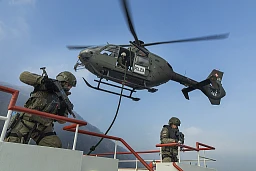 Switzerland. Ticino. Melano. Ticino State Police, Reparto Intervento Speciali. Special Intervention Unit (SIU). Training exercice with SIU men arriving by air on a ship following a hostage taking. 18.02.22 © 2022 Didier Ruef