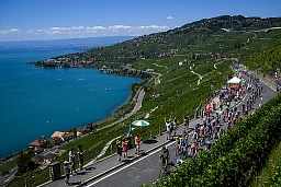 Cyclists climb the road through the UNESCO World Heritage Site of Lavaux with its terraced vineyards above Lake Geneva during the 9th stage of the Tour de France 2022 over 192,9 km from Aigle in Switzerland to Chatel in France, between Puidoux and Epesses, Switzerland, Sunday, July 10, 2022. Cyclists climb the road through the UNESCO World Heritage Site of Lavaux with its terraced vineyards above Lake Geneva during the 9th stage of the Tour de France 2022 over 192,9 km from Aigle in Switzerland to Chatel in France, between Puidoux and Epesses, Switzerland, Sunday, July 10, 2022.