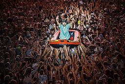 Olivio Ordonez from the French hip hop duo "Bigflo & Oli" (Bigflo et Oli) crosses the crowd on an inflatable boat as they perform on the main stage during the 46th edition of the Paleo Festival in Nyon, Switzerland, Friday, July 21, 2023. The Paleo is an open-air music festival with about 250,000 spectators in six days and will take place from 18 to 23 July.