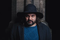 Alexandre Schmid, le nouveau guet titulaire, sur le beffroi de la Cathédrale de Lausanne, la nuit du 5 au 6 janvier 2024